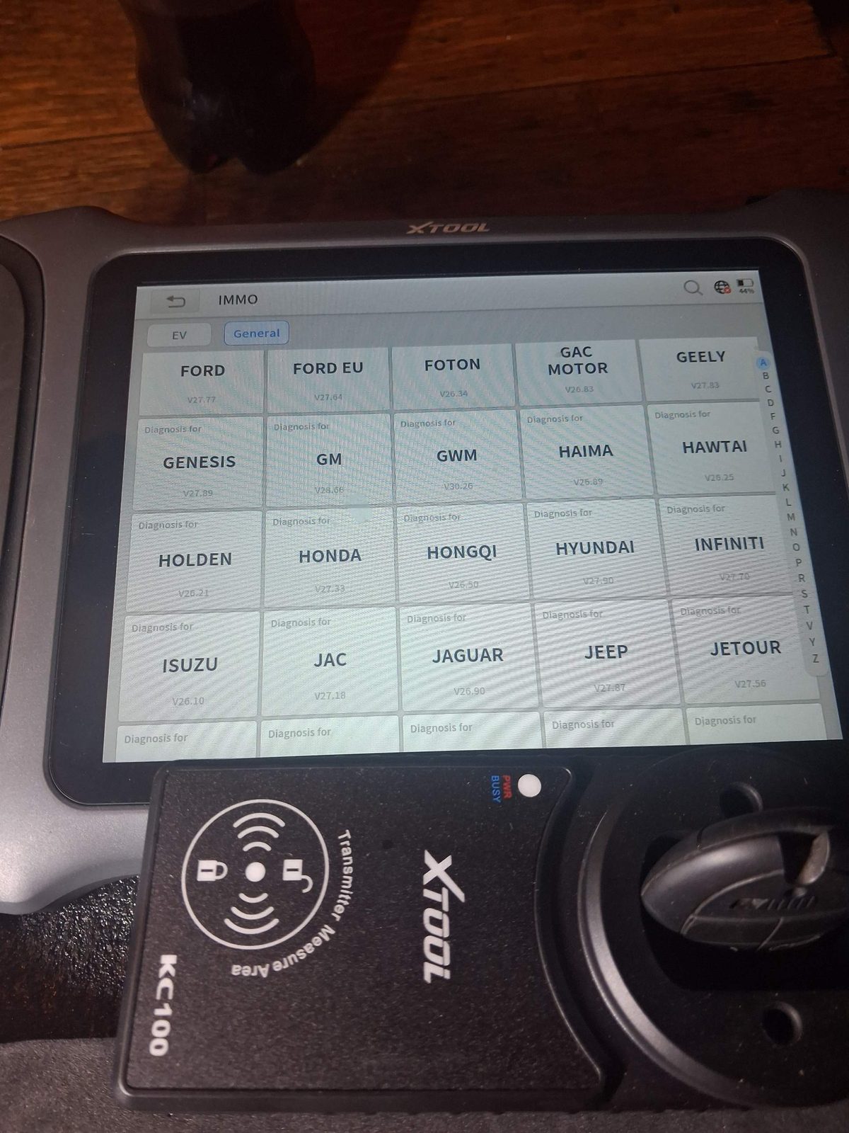 XTOOL key programmer with KC100 adapter programming a vehicle key
